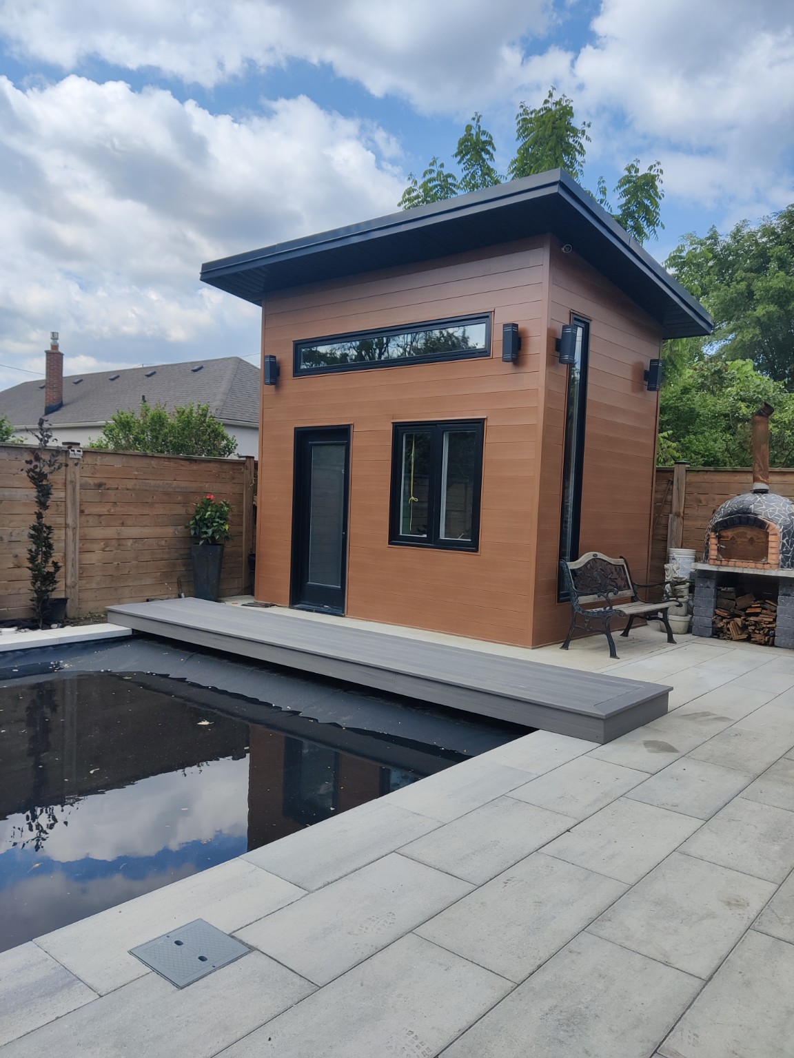 Poolside hardscape and lounge area